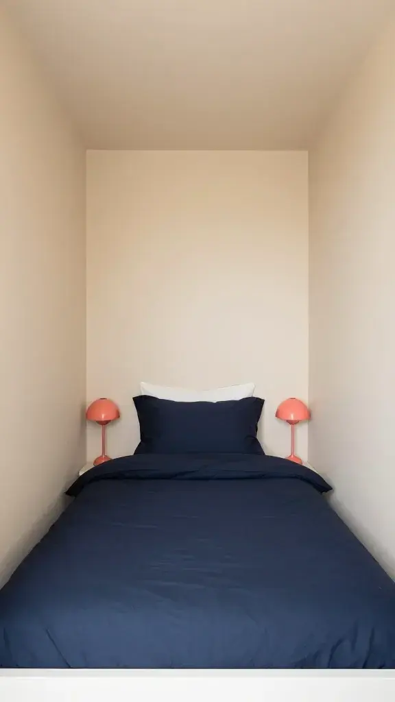 compact bedroom, 60% soft beige walls, 30% navy bedding, 10% coral lamps